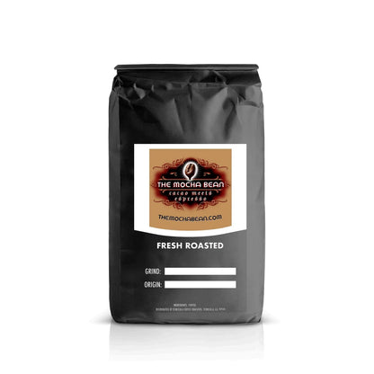 A black coffee bag against a clean white background with tan 'Mocha Bean' branding print on a black & white label.